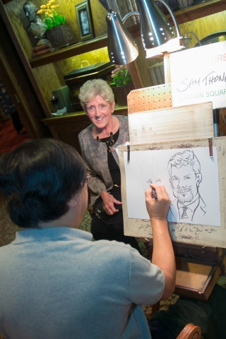 Sam Thong Caricaturist Does John Gabrenas and Wife at Reunion 50