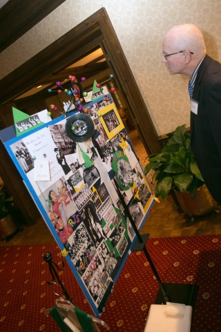 Tom Copeland Studies The Memory Board at Reunion 50